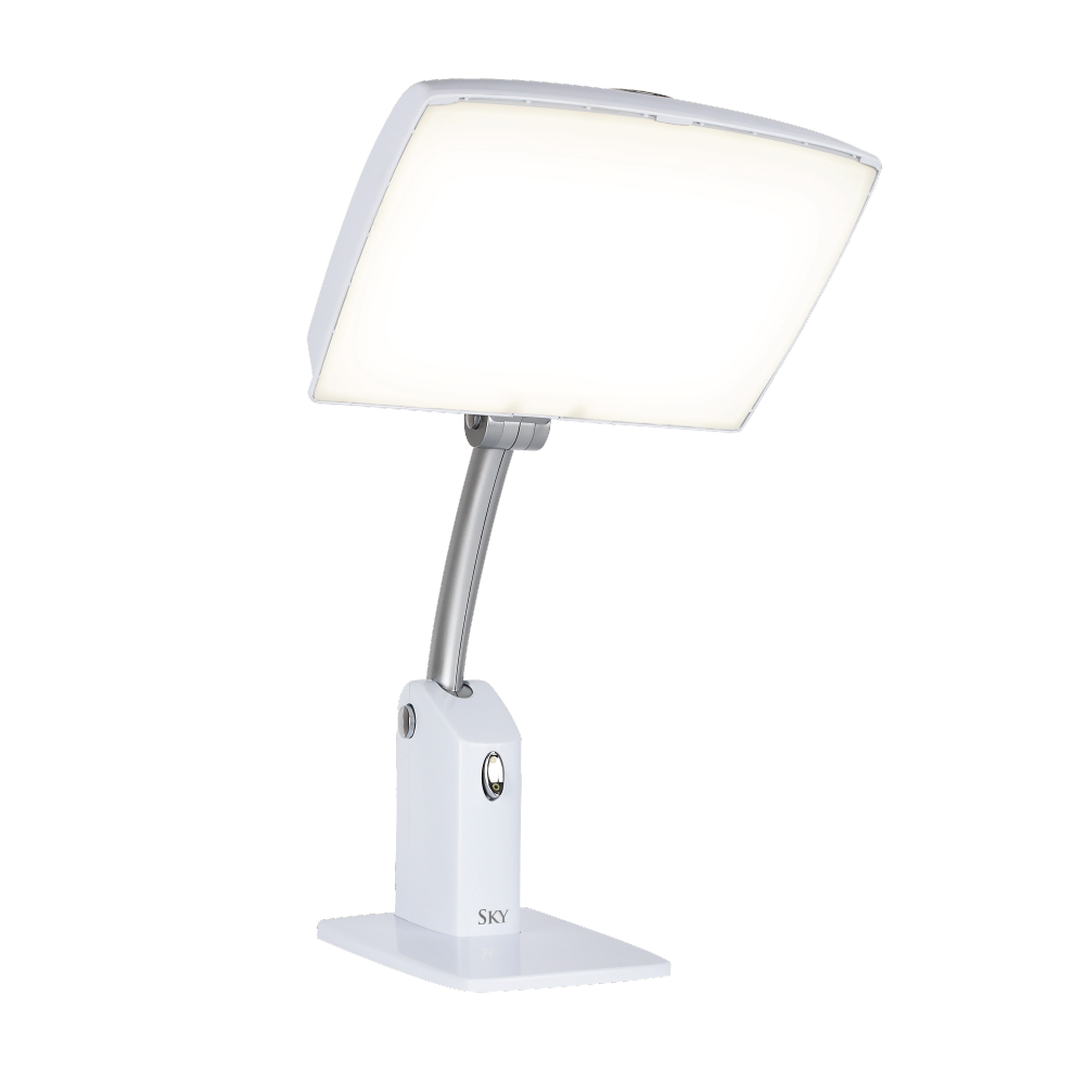 A white light therapy lamp on a white background