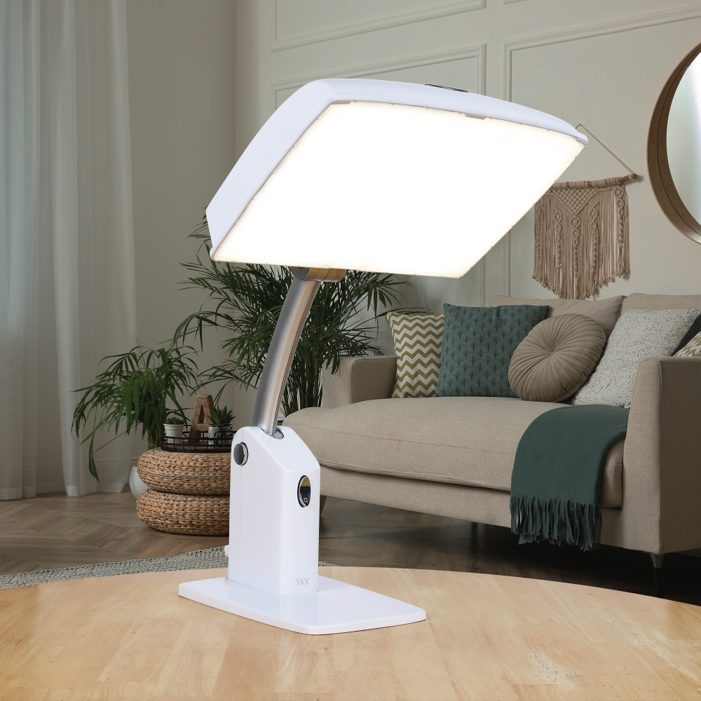 A white therapy lamp in a living room